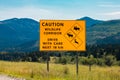 Deer moose elk crossing road signs Royalty Free Stock Photo