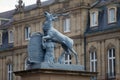 Deer sculpture with crest in front of the main entrance of the New Castle Neues Schloss in Germany, Stuttgart