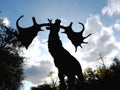 Deer/stag statue and sky