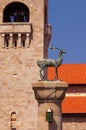 Deer statue and the bell tower of Evangelismos Church in Rhodes, Greece Royalty Free Stock Photo