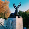 Deer statue on a bridge