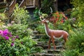 Deer statue and garden waterfall locate in thai temple