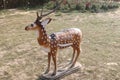 a deer statues on park