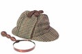 Deerstalker Hat and Retro Magnifying Glass Royalty Free Stock Photo