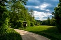 Deerstand Beneath Gravel Road In Deciduous Forest In Austria