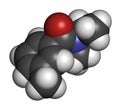 DEET (diethyltoluamide, N,N-Diethyl-meta-toluamide) insect repellent molecule. 3D rendering. Atoms are represented as spheres with Royalty Free Stock Photo