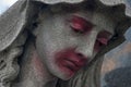 A defaced Statue of a Woman at a Grave Royalty Free Stock Photo