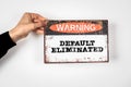 Default Eliminated. Warning sign with text on a white background