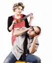 Defaulter husband and wife with hacksaw Royalty Free Stock Photo