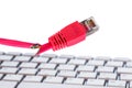 Defective network cable on keyboard Royalty Free Stock Photo