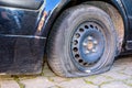A defective tire that needs to be replaced. Royalty Free Stock Photo