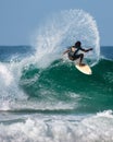 Defending champion in action at the Red bull ride my wave contest, performing cutback and huge spray