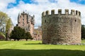 Defense turret with Glamis castle in background Royalty Free Stock Photo