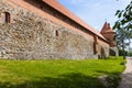 Defense wall and tower of Trakai Castle. Trakai, Lithuania, 10 June 2022 Royalty Free Stock Photo