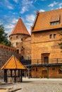 Defense walls, tower and courtyard of medieval gothic Bytow Castle of Teutonic Order in historic city center of Bytow, Poland