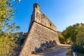 Defense walls and towers of medieval fortress Fort Carre castle in Antibes resort city onshore Mediterranean Sea in France Royalty Free Stock Photo