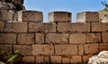 Defensive stop wall built by the British military in Wied Znuber valley Malta, to stop sea invasion. Royalty Free Stock Photo