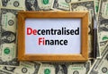DeFi, Decentralised finance symbol. Concept words `DeFi, Decentralised finance` on wooden frame. Beautiful background from dolla Royalty Free Stock Photo