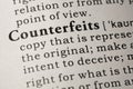 Definition of counterfeits Royalty Free Stock Photo