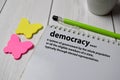Definition of Democracy word with a meaning on a book. dictionary concept Royalty Free Stock Photo