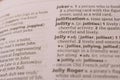 Definition Of English Dictionary Close Up Of Page With Word - jollity Royalty Free Stock Photo