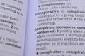 Definition Of English Dictionary Close Up Of Word - conspire Royalty Free Stock Photo