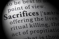 Definition of sacrifices Royalty Free Stock Photo