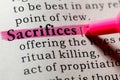Definition of sacrifices Royalty Free Stock Photo