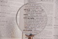 The definition of the word Bibliography in a dictionary, under magnifying glass, translator and language concept Royalty Free Stock Photo