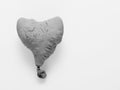 Deflate heart shape balloon in black and white isolated on white background Royalty Free Stock Photo