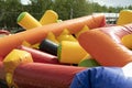 Deflate obstacle course in amusement park. Air escapes from inflatable structure. Details of collection of attractions