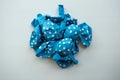 Deflated blue pastel with white dots rubber air balloon 