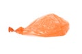 Deflated orange balloon isolated over white Royalty Free Stock Photo