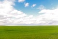 Defocus blue sky background with tiny white clouds and green meadow. Panorama blue sky background with clouds.. Windows Royalty Free Stock Photo