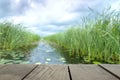 Defocus and blur image of terrace wood and Beautiful lake inside