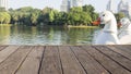 Defocus and blur image of terrace wood, white ducks and water,