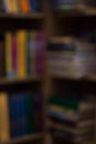 Defocus or blured shopping mall with abstract bookshelf bokeh light background in department store interior