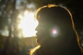 Defocus close-up silhouette of woman looking at sunrise. Mental health, hope, happiness concept. Dream autumn. Peace Royalty Free Stock Photo