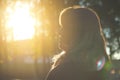 Defocus close-up silhouette of woman looking at sunrise. Mental health, hope, happiness concept. Dream autumn. Peace Royalty Free Stock Photo