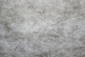Defocus grey spunbond non-woven geotextile close-up macro. Close up. Small spots. Dirtied texture. Design, background