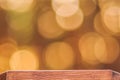 Defocus light at sunset. Golden sunset colors and wood background Royalty Free Stock Photo