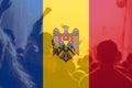 Defocus protest in Moldova. Moldova flag painted on many people hands background. Strength, Power, Protest concept. Out