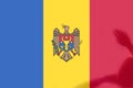 Defocus protest in Moldova. Moldova flag painted on many people hands background. Strength, Power, Protest concept