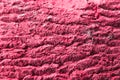 Defocus viva magenta. Color of the year 2023. red brick texture macro closeup, old detailed rough grunge texture. Red