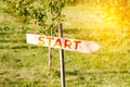 Defocus wooden sign. Start line on the highway concept for business planning, strategy and challenge or career path Royalty Free Stock Photo