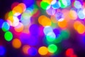 Defocused abstract multicolored bokeh lights background. Blue, purple, green, orange colors. - christmas and new year concept.