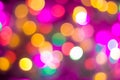 Defocused abstract multicolored bokeh lights background. Blue, purple, green, orange colors. - christmas and new year concept Royalty Free Stock Photo