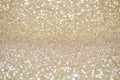 Defocused abstract pale gold lights background