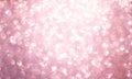 Defocused abstract pink twinkle light background.  Pink gold glittery bright shimmering background Royalty Free Stock Photo