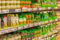 Defocused background, baby food supermarket shelves, fruit puree and porridge for feeding small children, bags and boxes Royalty Free Stock Photo